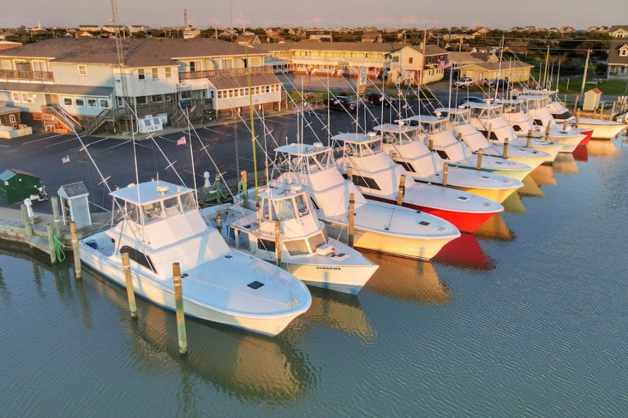 Aerial view of boats docked at marina.