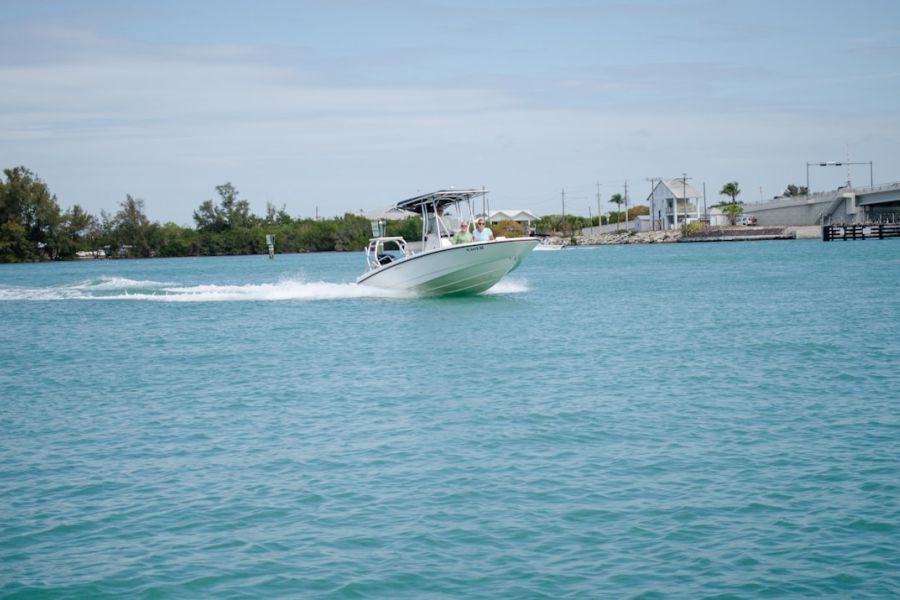 Speedboat gliding over turquoise water.