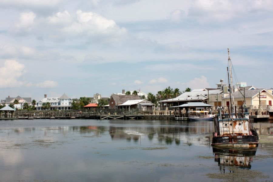 Harbor town with boats and wooden dock