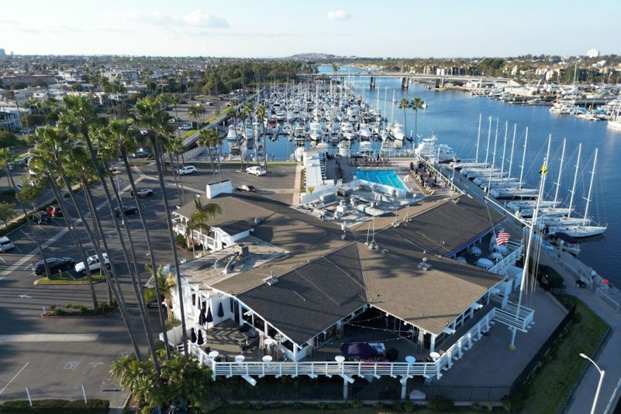 Aerial view of marina and waterfront restaurant.