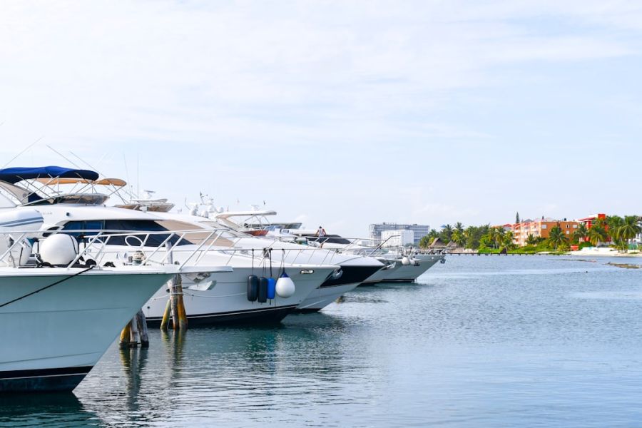 Yachts moored at a sunny marina