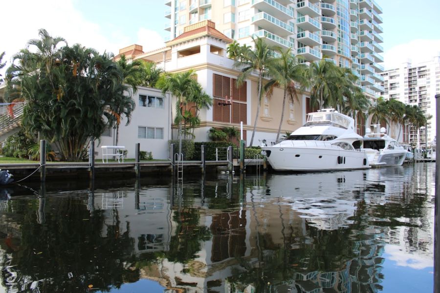 Yachts moored along tropical canal