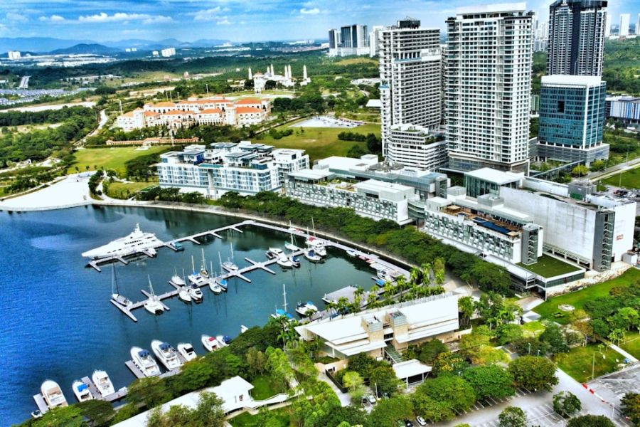 Aerial view of marina and skyscrapers.